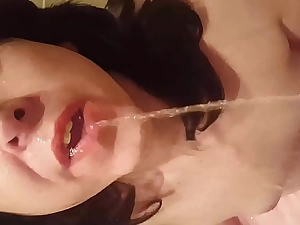 Sissy slut Luce gets piss and spunk on her face