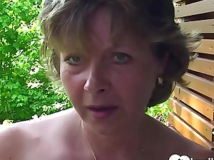 Busty milf shows her muff in a close-up